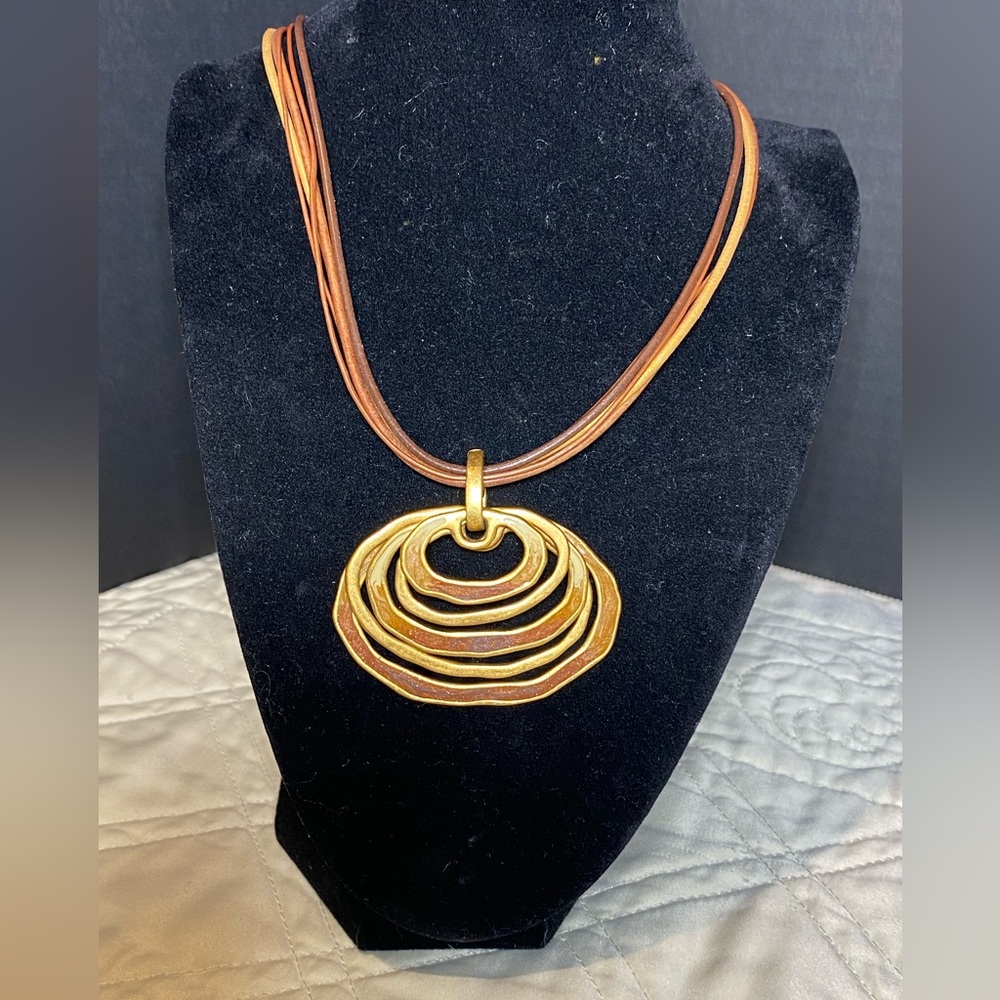 Chicos enameled brass pendant on 5 leather strands necklace